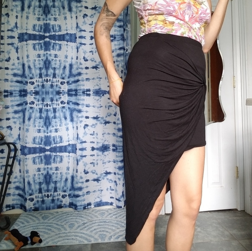 Knot draped asymmetrical skirt